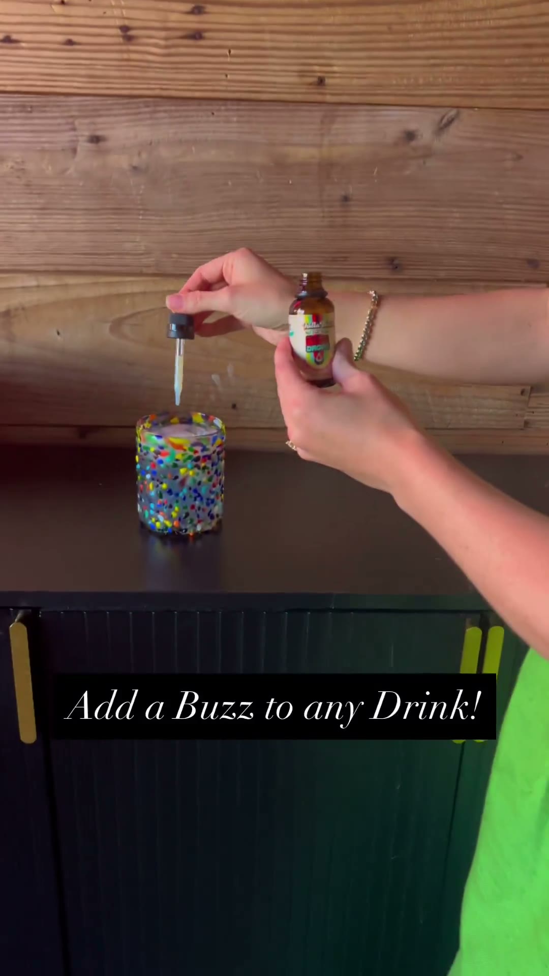 Buzz Drops being added to a drink